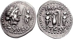 Denarius issued ca. 84-83 BC under Sulla picturing Venus with a diadem and a standing Cupid with a palm branch, and on the reverse two military trophies and religious implements (jug and lituus) Sulla Coin.jpg