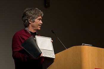 Alan Kay with "Dynabook" prototype