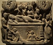 Gandhara. Shrouded Buddha, Subhadra, Ananda and tree-spirits