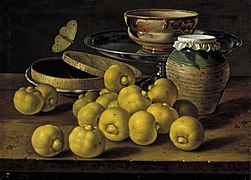 Bodegón de Luis Meléndez (ca. 1760) en el Museo del Prado, con limas, orza de miel con 'babero' vidriado en verde, caja de dulce, salvilla de peltre, sobre la que hay una vasija de loza mexicana, y mariposa.