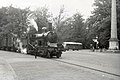 NS 1805 with a train at the road junction at the memorial needle at Het Loo in Apeldoorn. (1950)