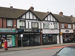 The last surviving public evidence of the name Surbiton Park. The pillar box marks the site of the former sub-post office.