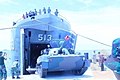 KRI Teluk Penyu menurunkan sebuah PT-76 di Kutai Timur pada 2013