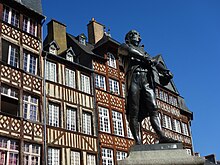 Timber-framed houses in Brittany Rennes-Place-du-Champ-Jacquet-Statue-Leperdit-Mars-2020.jpg