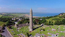 St. Declan's Round Tower and Oratory with Ardmore in the background