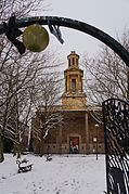 Tower of St Thomas in the Peace Garden, Birmingham through gate arch