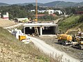 Erstellung des ersten Tunnelteils in offener, eckiger Bauweise im August 2007.