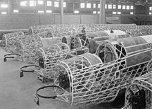 Wellingtons under construction, showing the geodetic airframe Wellingtons under construction WWII IWM CH 5980.jpg