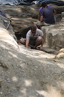 Archaeology student working on an archaeological excavation on the campus of St. Mary's College of Maryland. The college has an internationally recognized archaeology program, which it operates jointly with Historic St. Mary's City. Archeology student working on a colonial dig on the campus of St. Mary's College of Maryland..jpg
