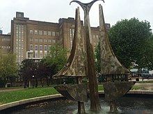 The main building with water sculpture Tipping Triangles by Angela Conner. The building is one of Europe's largest freestanding brick buildings. Astonmainbuilding.jpg