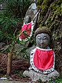 Jizō statues with the traditional red bibs.