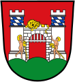 Auf einem Burgtor liegender Löwe im Wappen von Neuburg an der Donau