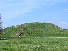 Monks Mound, a large structure built by the indigenous peoples in present-day Madison County, Illinois Monks Mound in July.JPG