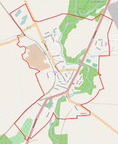 Mapa konturowa Płot, blisko centrum na dole znajduje się punkt z opisem „Cmentarz żydowski w Płotach”