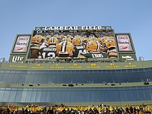 A photo of the part of Lambeau field that shows all of the Packers' retired numbers and player names.