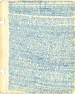 Page de cahier unie couverte d'une écriture fine et serrée dans une encre bleu clair