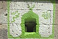 The air vent which allows one to see the much larger rooms underground (where the real graves can be seen)