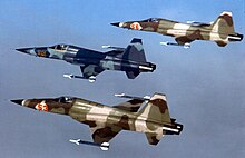 Northrop F-5E Tiger II Serials 73-0953, 0956 and 0985 of the 527th TFTAS in formation at RAF Alconbury, 1977 Three F-5E agressors from Alconbury 1983.jpg