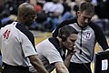 Image 4NBA officials Monty McCutchen (center), Tom Washington (#49) and Brent Barnaky reviewing a play. (from Official (basketball))