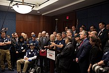 Stewart speaking at a press conference for the 9/11 first responders in 2019 911Presser 092519 (37 of 62) (46489501124).jpg