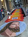 Ellaboración d'una alfombra de serrín amaneciendo. Xunu de 2008.