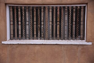 ornamental wood-barred window
