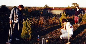 An informal "backyard croquet" match, Michigan, United States, 1994.