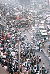 Dhaka, Bangladesh in 2006. Almost 97% of future population growth is expected to occur in developing countries. Dhaka street crowds.jpg