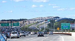 With 15 travel lanes and six shoulder lanes, Driscoll Bridge on the Garden State Parkway in Central Jersey is one of the world's widest and busiest motor vehicle bridges; the bridge crosses Raritan River near Raritan Bay.