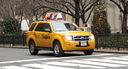 Ford Escape hybrid-electric taxi.