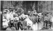 This is a picture of Governor Tang Jiyao arriving at opening of Hui Tien hospital. H. Gordon Thompson's daughter, Greta, aged 4, presenting the key to the hospital