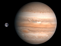 Größenvergleich zwischen Erde und Jupiter (maßstabsgerechte Fotomontage).