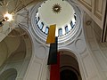 The dome from the inside and the Lithuanian flag split into three separate one-colour flags