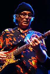 Ry Cooder plays the guitar.