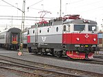 Rc6 in silver-and-red SSRT livery, operated by SJ, at Luleå C