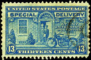 1944 13c Special Delivery stamp, showing a let...