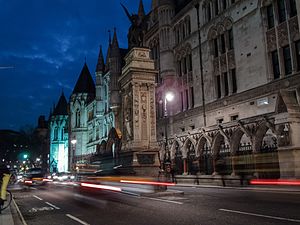 Any person in the UK who is significantly affected by a public body's act can challenge a decision by judicial review. The claims usually begin in the High Court. The Strand by night (8859630213).jpg