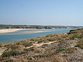 Strand an der Flussmündung des Rio Mira