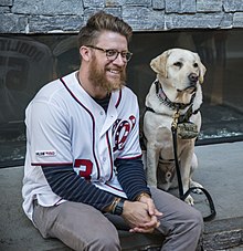 Sully with Sean Doolittle at Naval Support Activity Bethesda in 2019 Washington Nationals Visit USO (5314030) (cropped).jpg