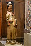 Statue de saint Étienne en bois et peint[7] datant du XVe siècle