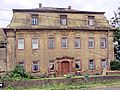 Herrenhaus, angebautes Nebengebäude, Terrasse, Reste der Toranlage und Einfriedung des Rittergutes