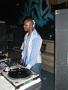 DJ SS performs at a rave.