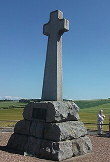 The Flodden memorial cross, erected in 1910, contemplated by the Tudor historian David Starkey. Flodden memorial.jpg