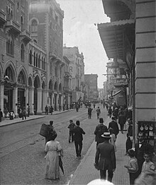 Cadde-i Kebir in 1912 (present-day Istiklal Avenue in Beyoglu). The entrance of the Church of St. Anthony of Padua is seen at left. A Nestle advertisement is visible on a building in the background. Grand Rue de Pera, Constantinople LCCN2004672935 (cropped).jpg