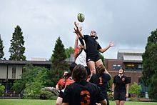 A rugby lineout being conducted. A group from either team lifts a player to fight and catch the ball for their team. (OSUWRC 2014) Rugby Lineout.jpg