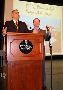 The College of New Jersey officials give a presentation on financial aid to admitted students. TCNJ college officials making financial aid presentation to admitted students and their parents.JPG
