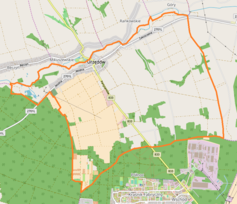 Mapa konturowa Urzędowa, blisko centrum u góry znajduje się punkt z opisem „Kościół św. Mikołaja i św. Otylii”