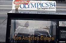 A Los Angeles Times news rack in 1984, with advertising for the 1984 Summer Olympics 1984-Newspaper-Vending-Machine.jpg