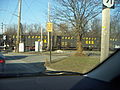 From what I can see of the lower half of the Ohio state route sign, it appears to be along Ohio State Route 91. I'll have to do a Google Maps scan for grade crossings like this.