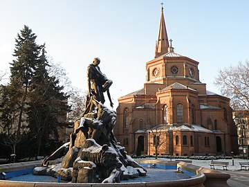 The fountain with St Peter's and St Paul's Church in the backdrop